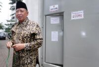 Mantan Wakil Presiden, Hamzah Haz, seusai menjenguk mantan Bupati Bangkalan Fuad Amin Imron di Rumah Tahanan (Rutan) KPK, Jakarta, Kamis, 2 April 2015. DOK.TEMPO/Eko Siswono Toyudho