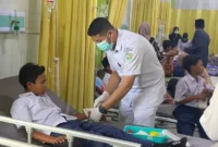 Pelajar yang diduga keracunan massal saat menjalani perawatan di RS TAS Beureunuen, Pidie, Rabu (24/7/2024) (ANTARA/Mira Ulfa)