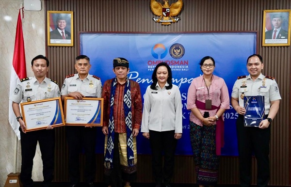 Kakanwil Ditjenim Bali, Felucia Sengky Ratna (ketiga dari kanan) menghadiri kegiatan Penyampaian Opini Ombudsman RI atas Penilaian Maladministrasi Pelayanan Publik Tahun 2025 di Aula Balai Pemasyarakatan (Bapas) Denpasar, Kamis (12/2/2026).(Foto: Ditjenim Bali)