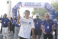 Sekjen DPN Peradi SAI A. Patra M. Zein (kaos putih) bersama jajaran Pengurus DPN, DPC saat mengikuti Fun Walk yang diselenggarakan DPC Peradi SAI Jakarta Utara di Ancol, Sabtu (29/8/2026). (Foto: istimewa)