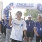 Sekjen DPN Peradi SAI A. Patra M. Zein (kaos putih) bersama jajaran Pengurus DPN, DPC saat mengikuti Fun Walk yang diselenggarakan DPC Peradi SAI Jakarta Utara di Ancol, Sabtu (29/8/2026). (Foto: istimewa)