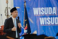 Stafsus Menag Gugun Gumilar saat Orasi Ilmiah di Sekolah Tinggi Agama Hindu (STAH) Dharma Nusantara Jakarta, Sabtu (4/10/2026). (Foto: istimewa)